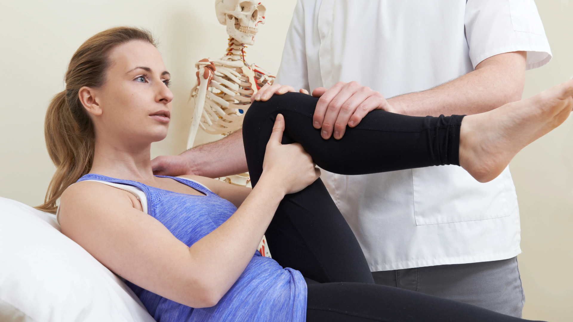 Physiotherapist treating knee and joint injuries